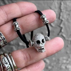 Shinny cz diamonds skull charm choker necklace on adjustable black suede cord